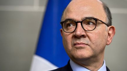 Pierre Moscovici, alors ministre de l'Economie,&nbsp;le 6 mars 2014 &agrave; Paris. (FABRICE COFFRINI / AFP)