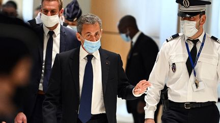 Nicolas Sarkozy au palais de justice de Paris, le 1er mars 2021. (ANNE-CHRISTINE POUJOULAT / AFP)