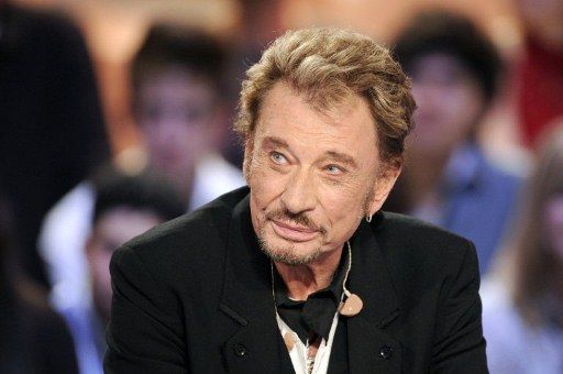 Johnny Hallyday lors du Grand journal de Canal + en mars 2011 (AFP PHOTO / BERTRAND GUAY)