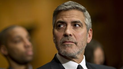 George Clooney, le 14 mars 2012 &agrave; Washington, devant une commission du S&eacute;nat am&eacute;ricain. (BENJAMIN MYERS / REUTERS)