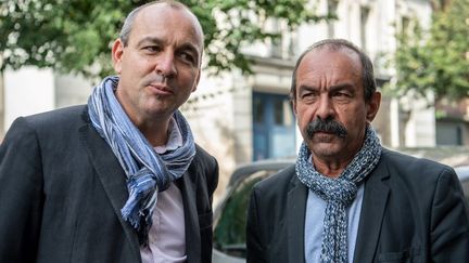 Les secrétaires généraux de la CFDT et de la CGT Laurent Berger (à gauche) et Philippe Martinez (à droite), le 29 septembre 2021&nbsp;à Paris. (BERTRAND GUAY / AFP)