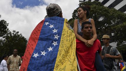 Des opposants à Nicolas Maduro manifestent à Caracas (Venezuela), le 30 janvier 2019. (YURI CORTEZ / AFP)