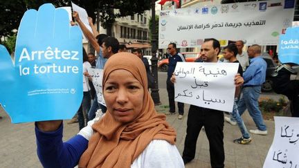 Manifestants contre la torture à Tunis, le 15 octobre 2014.