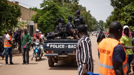 Marche de l'opposition burkinabè à Ouagadougou, le 3 juillet 2021, pour protester contre l'aggravation de la situation sécuritaire et demander une réponse aux attaques jihadistes. (OLYMPIA DE MAISMONT / AFP)