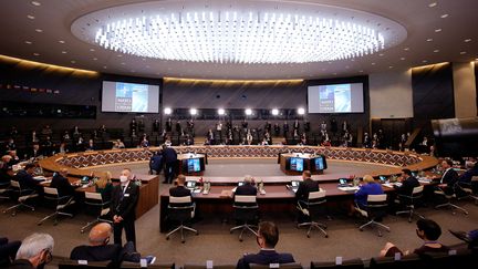 Les dirigeants des pays membres de l'Otan réunis en session plénière, au sommet annuel de l'organisation, le 14 juin 2021. (OLIVIER MATTHYS / POOL / AFP)