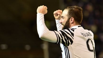 Gonzalo Higuain continue de régaler avec la Juve (GIUSEPPE CACACE / AFP)