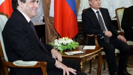 François Fillon et Vladimir Poutine à Moscou (9 décembre 2010) (AFP / Alexey Druzhinin)