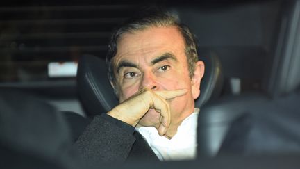 Carlos Ghosn à la sortie du bureau de son avocat, le 6 mars 2019. (KAZUHIRO NOGI / AFP)