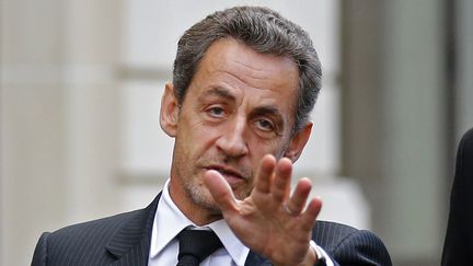 L'ex-pr&eacute;sident de la R&eacute;publique Nicolas Sarkozy, &agrave; Paris, le 26 novembre 2012 apr&egrave;s un d&eacute;jeuner avec Fran&ccedil;ois Fillon. (BENOIT TESSIER / AFP)