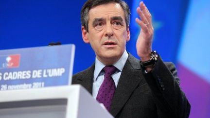 François Fillon prononce un discours lors d'une convention UMP, à Paris, le 26 novembre 2011. (AFP - PIERRE VERDY)