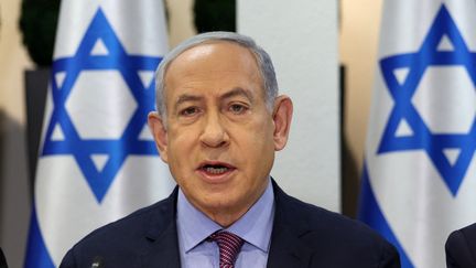 Israeli Prime Minister Benjamin Netanyahu during a press briefing in Tel Aviv on December 31, 2023.  (Abir Sultan / AFP)