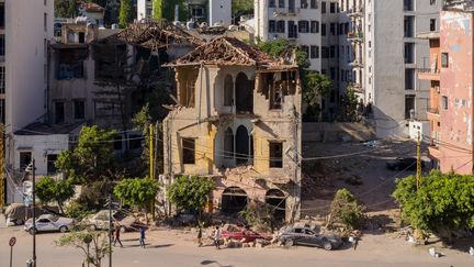 Un bâtiment à Beyrouth très endommagé et photographié quelques jours après l'explosion du 4 août 2020 dans le port de la capitale libanaise.&nbsp; (HAYTHAM AL ACHKAR / GETTY IMAGES EUROPE)