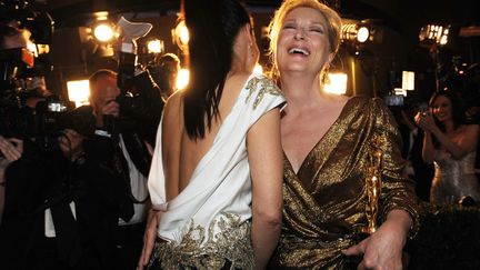 Meryl Streep (D) et Sandra Bullock, radieuses. (VALERIE MACON / AFP)