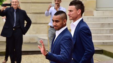 Dimitri Payet et Laurent Koscielny, le 11 juillet 2016, à leur sortie de l'Elysée après la finale de l'Euro 2016 en France. (VOIX DU NORD / MAXPPP)