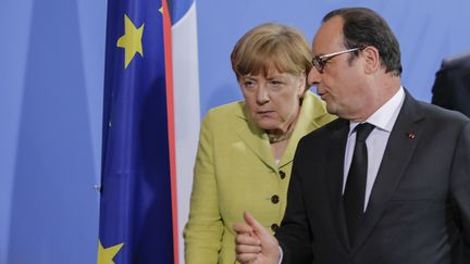 Angela Merkel et Fran&ccedil;ois Hollande &agrave; Berlin (Allemagne), le 1er juin 2015. (REYNALDO PAGANELLI / NURPHOTO / AFP)