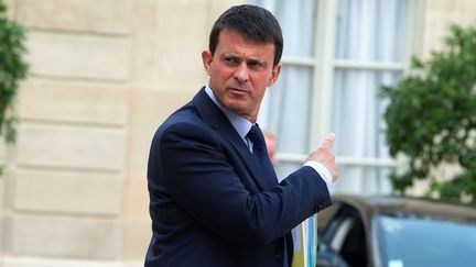 Le ministre de l'Int&eacute;rieur, Manuel Valls, dans la cour de l'Elys&eacute;e, le 28 ao&ucirc;t 2013. (PDN / SIPA)