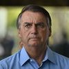 Le président brésilien Jair Bolsonaro à Brasilia (Brésil), lors d'une conférence de presse, le 19 octobre 2022. (MATEUS BONOMI / ANADOLU AGENCY / AFP)