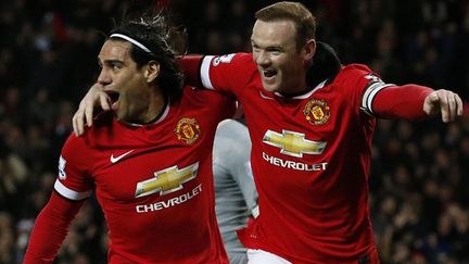 Radamel Falcao et Wayne Rooney (Manchester United) (LINDSEY PARNABY / AFP)