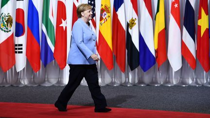 La chancelière allemande Angela Merkel, lors du sommet du G20 à Osaka (Japon), le 28 juin 2019.&nbsp; (BRENDAN SMIALOWSKI / AFP)