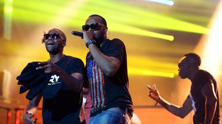 Le groupe de rap Sexion d'Assaut, lors d'un concert au Stade de France, le 28 septembre 2013. (PIERRE ANDRIEU / AFP)