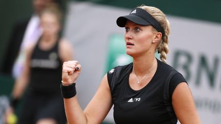 La Fran&ccedil;aise Kristina Mladenovic lors son match contre la Canadienne Eugenie Bouchard, mardi 26 mai, &agrave; Roland-Garros. (PATRICK KOVARIK / AFP)