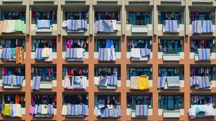 Les vacances d'hiver sont termin&eacute;es pour les &eacute;tudiants chinois. Et traditionnellement, &agrave; leur retour dans leurs chambres universitaires, ils a&egrave;rent leurs draps et garde-robes avant de reprendre les cours, Zhejiang (Chine), le 13 mars 2012. (CHINAFOTOPRESS / MAXPPP)