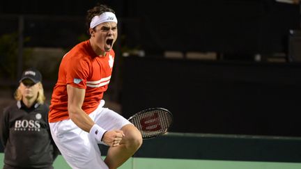 Milos Raonic exulte