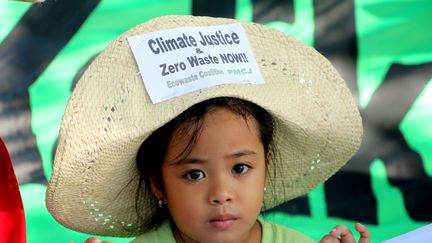 Les enfants aussi&nbsp;ont participé à la mobilisation, comme ici à Quetzon City (Philippines). (GREGORIO B. DANTES JR / PAC / SIPA / PACIFIC PRESS)