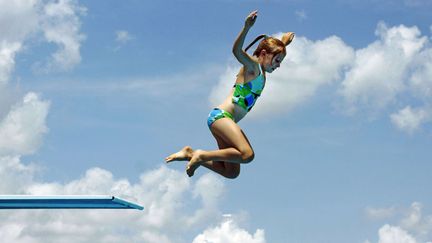 Hutchinson (Kansas), 38&deg;C, le 2 juillet 2012. Vive les piscines d&eacute;couvertes! (TRAVIS MORISSE / AP / SIPA)