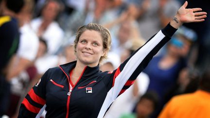 Kim Clijsters et sa fille, Jade, après sa victoire à l'US Open 2009 (YORICK JANSENS / BELGA MAG)