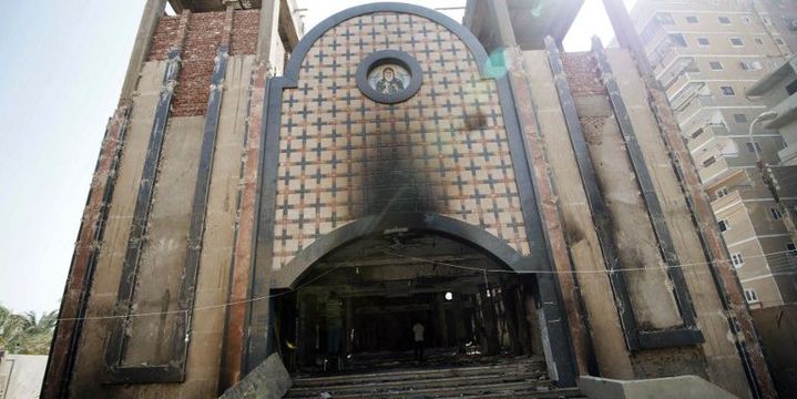 La façade de l'église copte Amba Moussa, incendiée en août 2013. (GIANLUIGI GUERCIA / AFP )