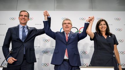  Eric Garcetti, Thomas Bach et Anne Hidalgo (FABRICE COFFRINI / AFP)