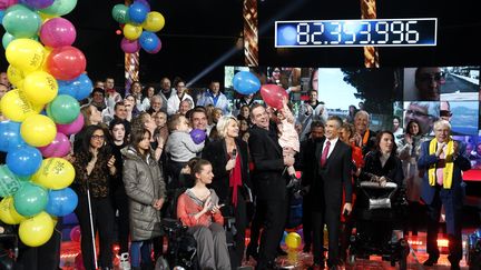 Le compteur du T&eacute;l&eacute;thon 2014 s'arr&ecirc;te avec plus de 82 millions d'euros de promesses de dons, dans la nuit du 6 au 7 d&eacute;cembre 2014. (FRANCOIS GUILLOT / AFP)