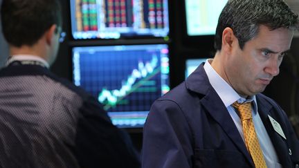 Des traders &agrave; la Bourse de New York (Etats-Unis), le 7 mai 2012. (SPENCER PLATT / GETTY / AFP)