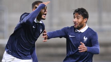 Layvin Kurzawa chambre ses adversaires après avoir marqué le but qui aurait pu qualifier les bleuets. Il n'aurait pas dû... (JONATHAN NACKSTRAND / AFP)