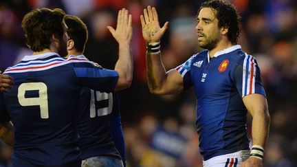 Le Fran&ccedil;ais Yoann Huget apr&egrave;s son interception d&eacute;cisive lors du match contre l'Ecosse, &agrave; Edimbourg, dans le Tournoi des six nations, samedi 8 mars 2014.&nbsp; (ANDREW YATES / AFP)