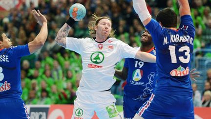 Les Experts Narcisse, Karabatic et Abalo en défense devant le Norvégien Lund