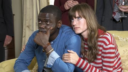 L'acteur britannique Daniel Kaluuya et l'actrice américaine Allison Williams dans "Get Out", de Jordan Peele, sorti en France mercredi 3 mai 2017. (BLUMHOUSE PRODUCTIONS / QC ENTER / AFP)