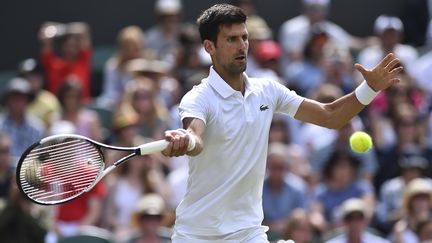 Début de tournoi tranquille pour Novak Djokovic (GLYN KIRK / AFP)