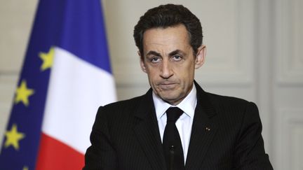 Le pr&eacute;sident Nicolas Sarkozy s'exprime, le 19 mars 2012, depuis l'Elys&eacute;e, apr&egrave;s la fusillade qui s'est produite dans un coll&egrave;ge-lyc&eacute;e juif de Toulouse.&nbsp; (LIONEL BONAVENTURE / AFP)