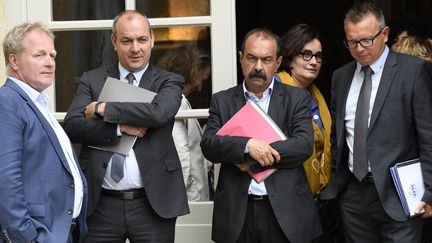 Les syndicalistes François Hommeril, Laurent Berger, Philippe Martinez, Angeline Barth et Cyril Chabanier après avoir assisté à une conférence avec l'exécutif à l'hôtel Matignon à Paris, le 17 juillet 2020. (BERTRAND GUAY / AFP)