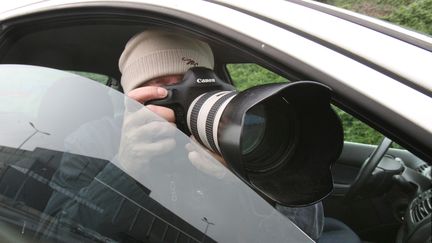 Un détéctive privé prend des photos. Photo d'illustrations.
 (LUDOVIC PETIOT / MAXPPP)