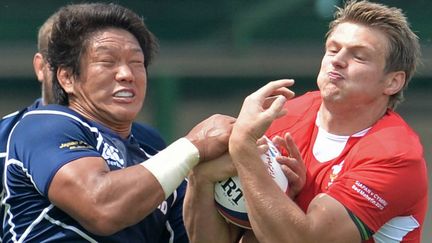 Dan biggar (Galles) et Takashi Kikutani (Japon). 