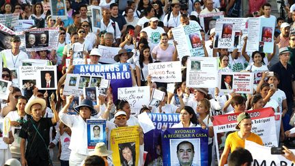 Des proches de personnes disparues&nbsp;participent à une manifestation contre la violence à Guadalajara, au Mexique, le 4 mai 2018.&nbsp; (ULISES RUIZ / AFP)