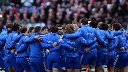 Le XV de France uni autour de son capitaine (FILIPPO MONTEFORTE / AFP)