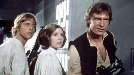 Mark Hamill, Carrie Fisher et Harrison Ford dans "La Guerre des &eacute;toiles",&nbsp;en 1977. (LUCASFILM / PHOTONONSTOP / AFP)