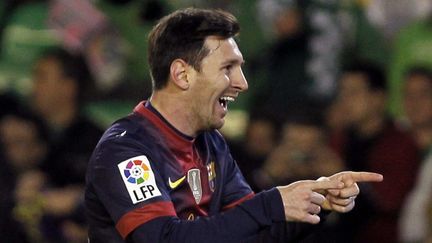 L'attaquant argentin du FC Barcelone Lionel Messi f&ecirc;te son but contre le Betis S&eacute;ville, le 9 d&eacute;cembre 2012. (JULIO MUNOZ/EFE/SIPA)