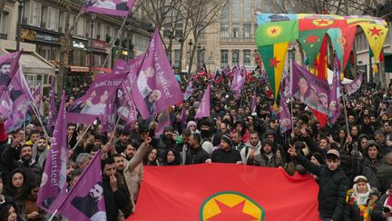 Demonstrators carry a flag of the Kurdistan Workers' Party (PKK), during a demonstration by the Kurdish community in Paris, January 6, 2024. (DIMITAR DILKOFF / AFP)