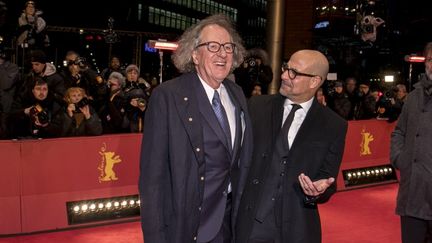 L'acteur Geoffrey Rush et Stanley Tucci lors de la première projection de "Final Portrait" à Berlin. (HUBERT BOESL / DPA)