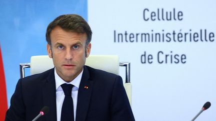 Emmanuel Macron, le 30 juin 2023, à Paris. (YVES HERMAN / AFP)